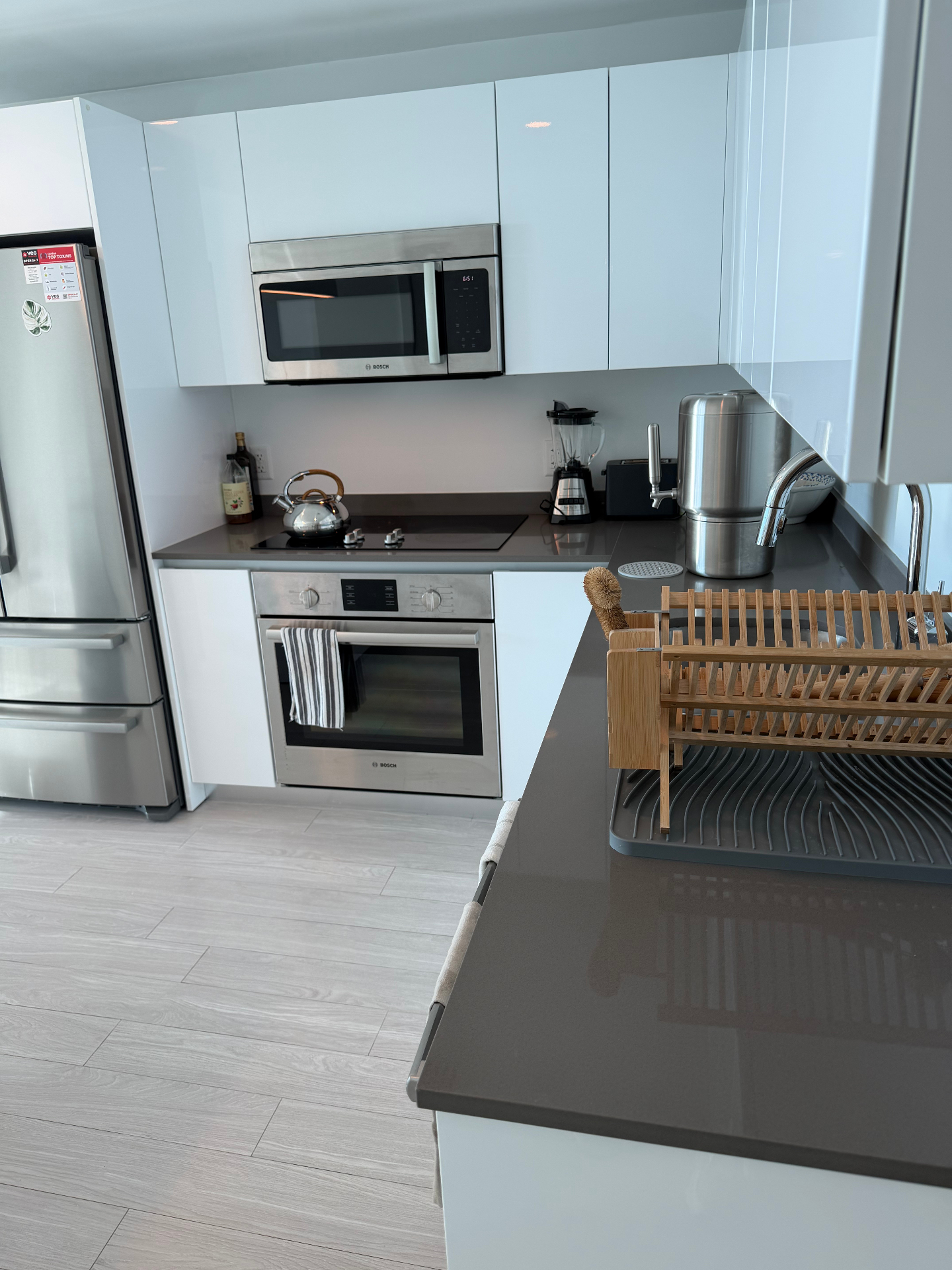 Spotless bright kitchen with clear counters after cleaning