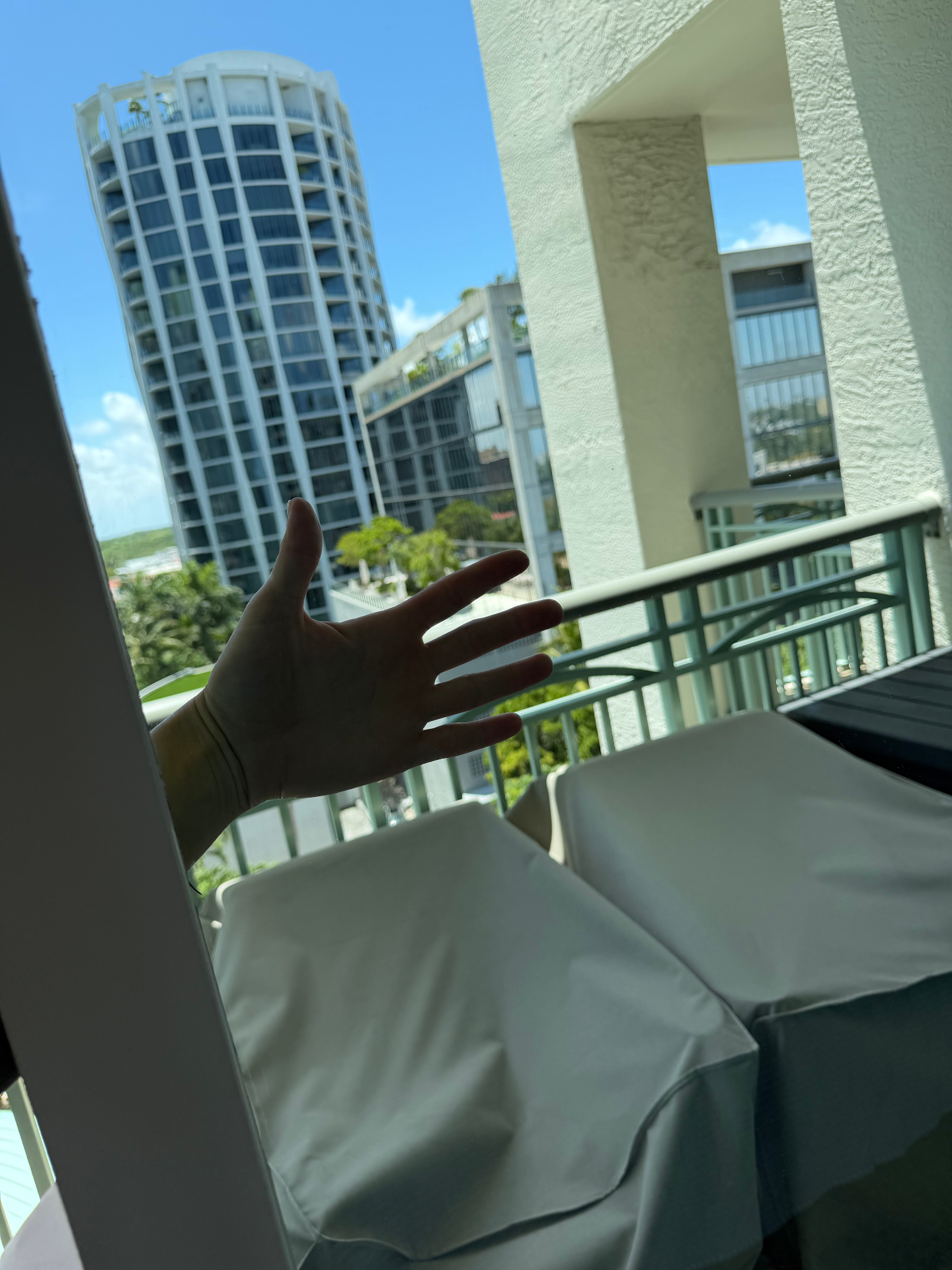 Clean condo window with a clear Miami skyline view after professional glass cleaning